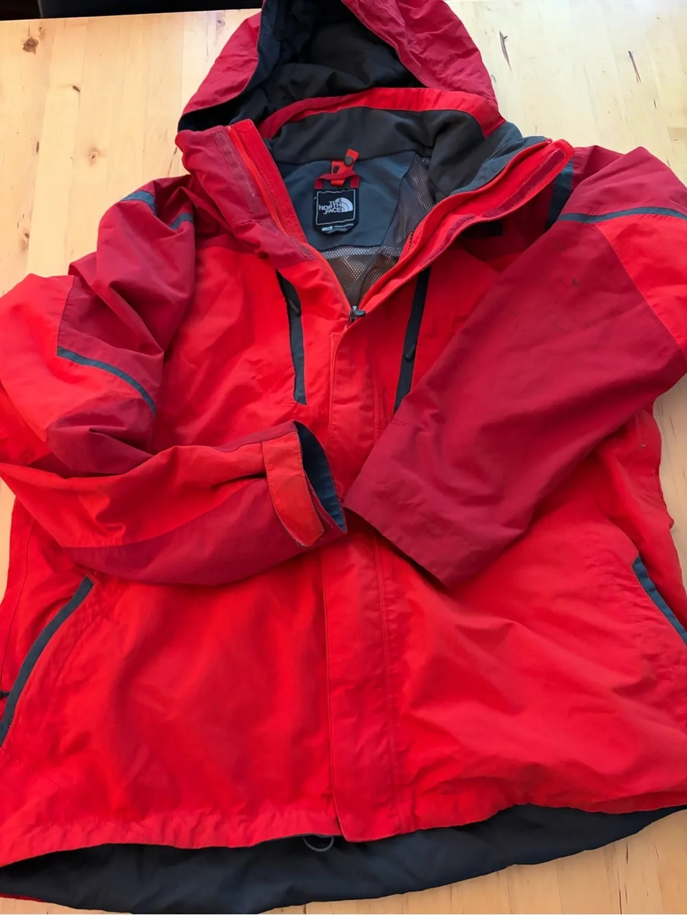 The North Face Men's Red Hooded Raincoat with Contrast Trim
